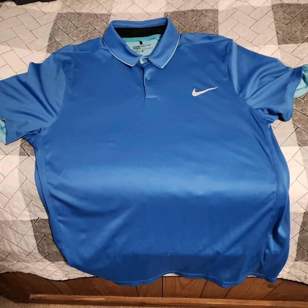 NWOT Nike Golf dri-fit polo. BLUE. Large.
